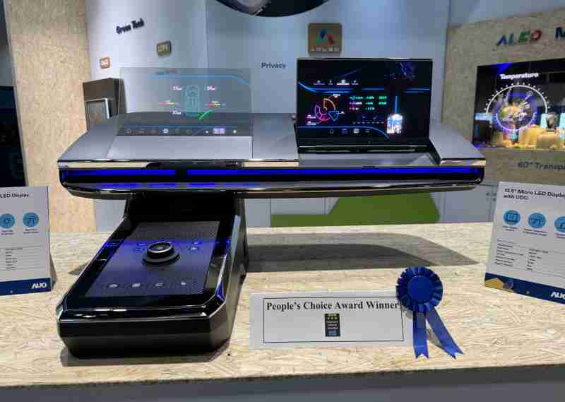 财神娱乐车用Micro LED Display HMI解决方案获”最佳车用显示奖”，，以用户为中心开发，，针对前座驾驶与乘客设计兼具娱乐与安全的高画质屏幕，，包含车舱前座的Micro LED透明屏幕及全球首款内建镜头的智慧Micro LED显示器